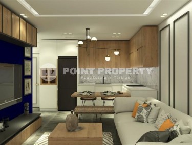 Apartment 1+1 in a residential complex at the final stage of construction, within walking distance from the center of Mahmutlar-id-7935-photo-2