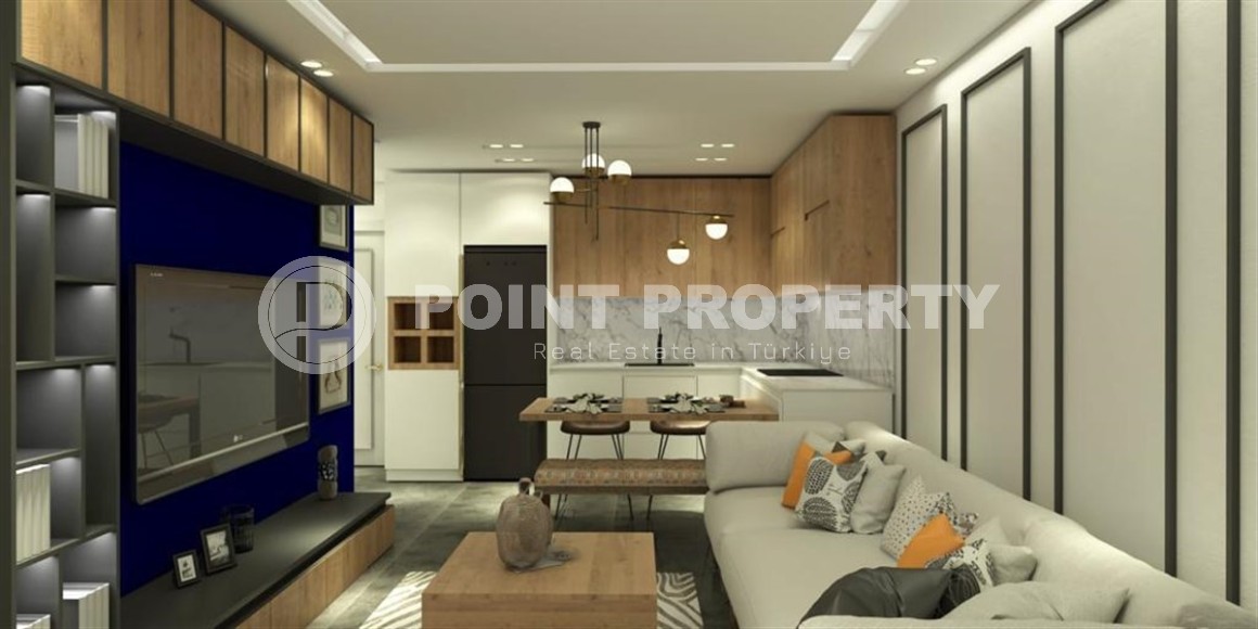 Квартира 1+1 в жилом комплексе на завершающем этапе строительства, в нескольких минутах ходьбы от центра района Махмутлар-id-7935-фото-2