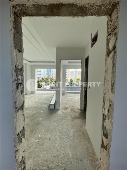 Квартира 1+1 в жилом комплексе на завершающем этапе строительства, в нескольких минутах ходьбы от центра района Махмутлар-id-7935-фото-10