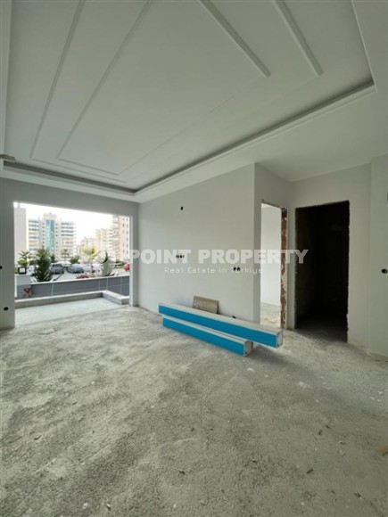 Квартира 1+1 в жилом комплексе на завершающем этапе строительства, в нескольких минутах ходьбы от центра района Махмутлар-id-7935-фото-11