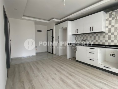 Доступная по цене квартира 1+1, общей площадью 55 м2, в центре популярного района Аланьи - Махмутлар-id-7941-фото-3