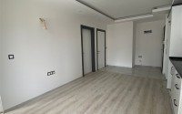 Доступная по цене квартира 1+1, общей площадью 55 м2, в центре популярного района Аланьи - Махмутлар-id-7941-фото-4