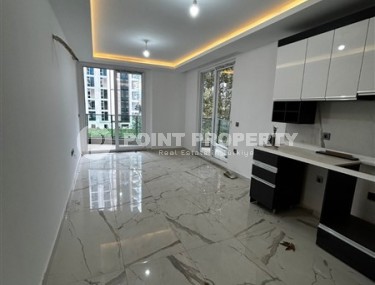 New apartment in the center of Mahmutlar district, on the 1st floor in a residential complex, commissioned in 2023-id-7946-photo-2