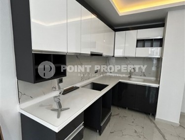 New apartment in the center of Mahmutlar district, on the 1st floor in a residential complex, commissioned in 2023-id-7946-photo-3