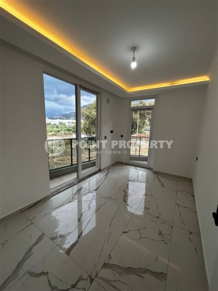 Новая квартира в центре района Махмутлар, на 1-м этаже в жилом комплексе, введенном в эксплуатацию в 2023 году-id-7946-фото-4