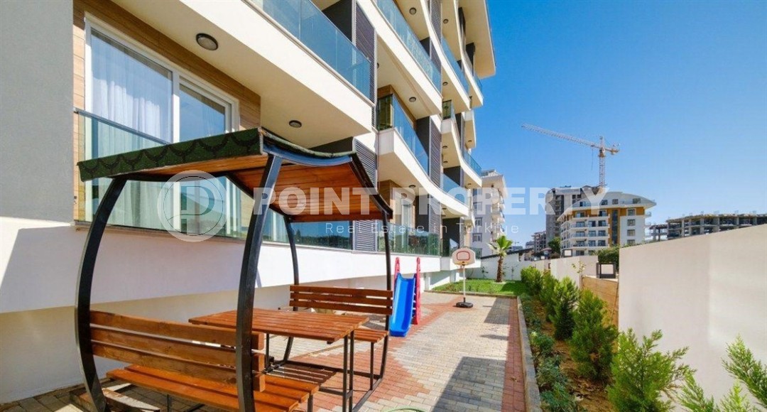 Новая квартира в центре района Махмутлар, на 1-м этаже в жилом комплексе, введенном в эксплуатацию в 2023 году-id-7946-фото-13