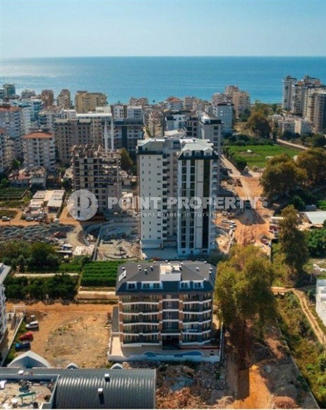 Новая квартира в центре района Махмутлар, на 1-м этаже в жилом комплексе, введенном в эксплуатацию в 2023 году-id-7946-фото-14