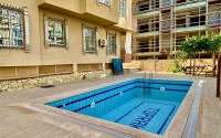 Three-room apartment, 120 m² in the heart of Alanya in a cozy residence with infrastructure-id-1619-photo-19
