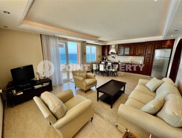 Large view apartment with two bedrooms, 120m², on the first line in Mahmutlar, Alanya-id-1621-photo-3