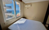 Large view apartment with two bedrooms, 120m², on the first line in Mahmutlar, Alanya-id-1621-photo-11