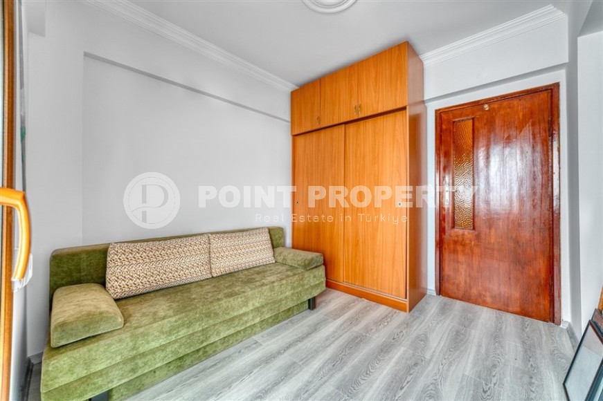 Квартира с роскошной локацией на первой линии от моря, в центре района Махмутлар-id-7970-фото-11