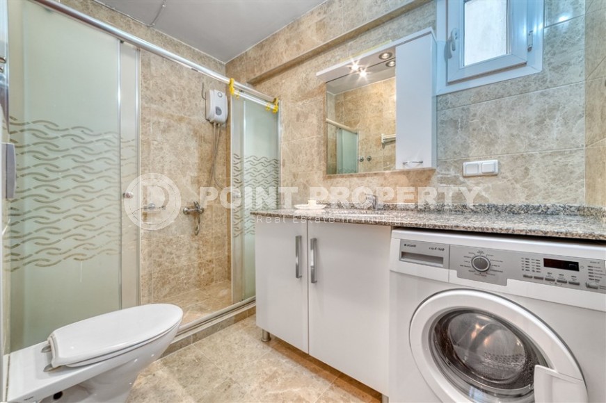 Квартира с роскошной локацией на первой линии от моря, в центре района Махмутлар-id-7970-фото-14