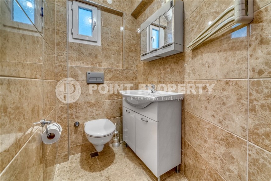 Квартира с роскошной локацией на первой линии от моря, в центре района Махмутлар-id-7970-фото-15