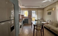 Advantageous offer - inexpensive 3+1 apartment, with a total area of 125 m2, in the center of Mahmutlar district-id-7975-photo-2