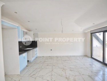 New two-level apartment with fine finishing 900 meters from the sea, in the modern area of Alanya - Mahmutlar-id-7980-photo-3