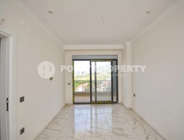 New two-level apartment with fine finishing 900 meters from the sea, in the modern area of Alanya - Mahmutlar-id-7980-photo-5