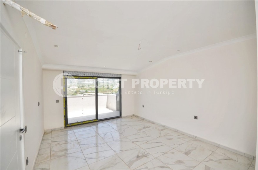 Новая двухуровневая квартира с чистовой отделкой в 900 метрах от моря, в современном районе Аланьи - Махмутлар-id-7980-фото-6