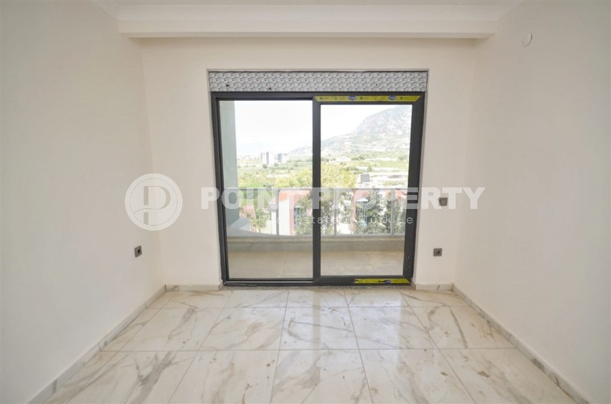 Новая двухуровневая квартира с чистовой отделкой в 900 метрах от моря, в современном районе Аланьи - Махмутлар-id-7980-фото-8