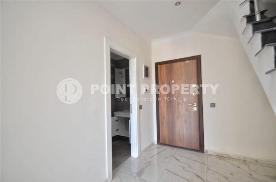 Новая двухуровневая квартира с чистовой отделкой в 900 метрах от моря, в современном районе Аланьи - Махмутлар-id-7980-фото-11