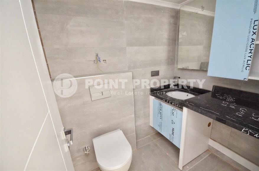 Новая двухуровневая квартира с чистовой отделкой в 900 метрах от моря, в современном районе Аланьи - Махмутлар-id-7980-фото-13