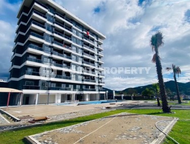 Inexpensive 1+1 apartment, with a total area of 55 m2, in the picturesque area of Alanya - Demirtas-id-7983-photo-1