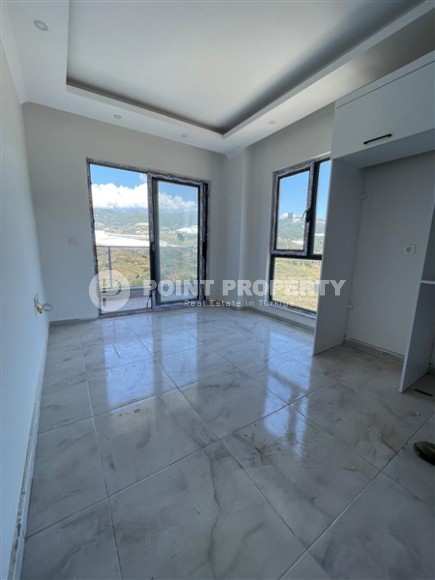 Недорогая квартира 1+1, общей площадью 55 м2, в живописном района Аланьи - Демирташ-id-7983-фото-2