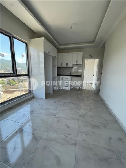 Недорогая квартира 1+1, общей площадью 55 м2, в живописном района Аланьи - Демирташ-id-7983-фото-3