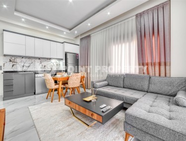 Stylish apartment with modern design 900 meters from the sea, in the center of Alanya-id-7984-photo-1