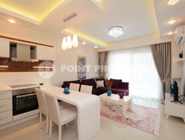 Modern, comfortable 1+1 apartment 250 meters from the beach, in the center of Mahmutlar-id-7986-photo-1