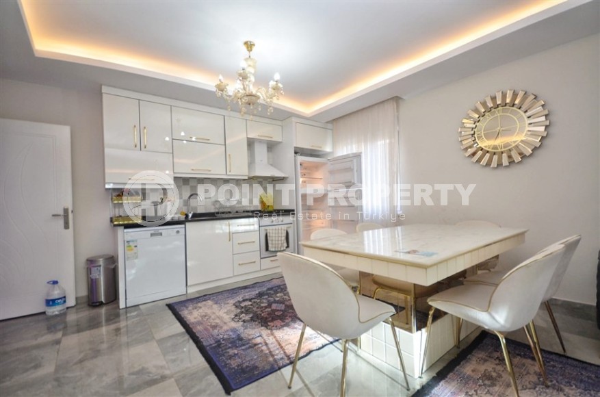 Ready-to-move-in apartment 2+1 200 meters from the sea, in the center of the popular resort area of Alanya - Mahmutlar-id-7987-photo-3