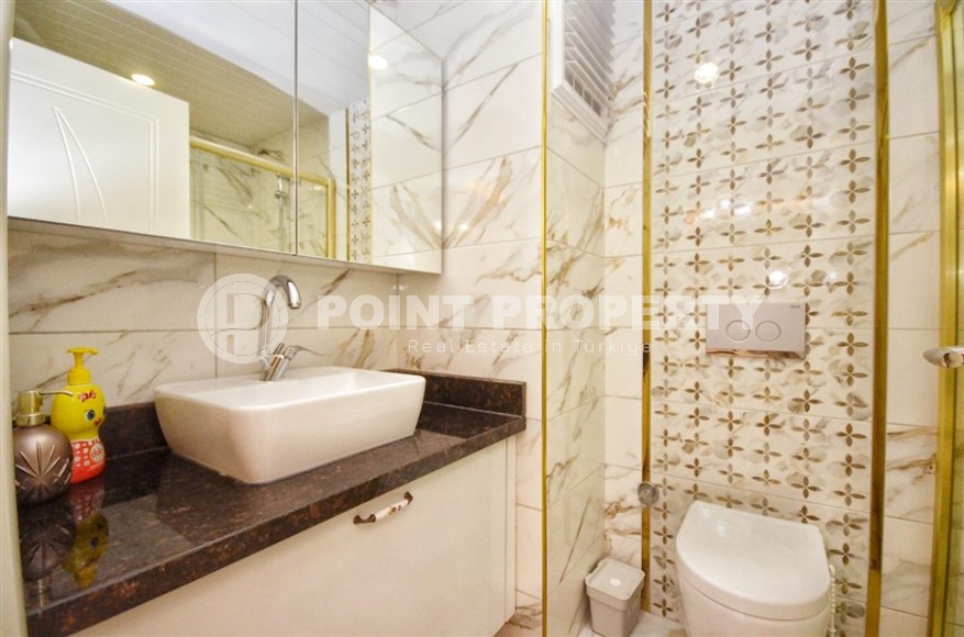 Ready-to-move-in apartment 2+1 200 meters from the sea, in the center of the popular resort area of Alanya - Mahmutlar-id-7987-photo-9