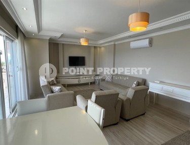 Благоустроенная квартира с роскошной локацией на первой линии от моря, в центре района Махмутлар-id-7989-фото-2