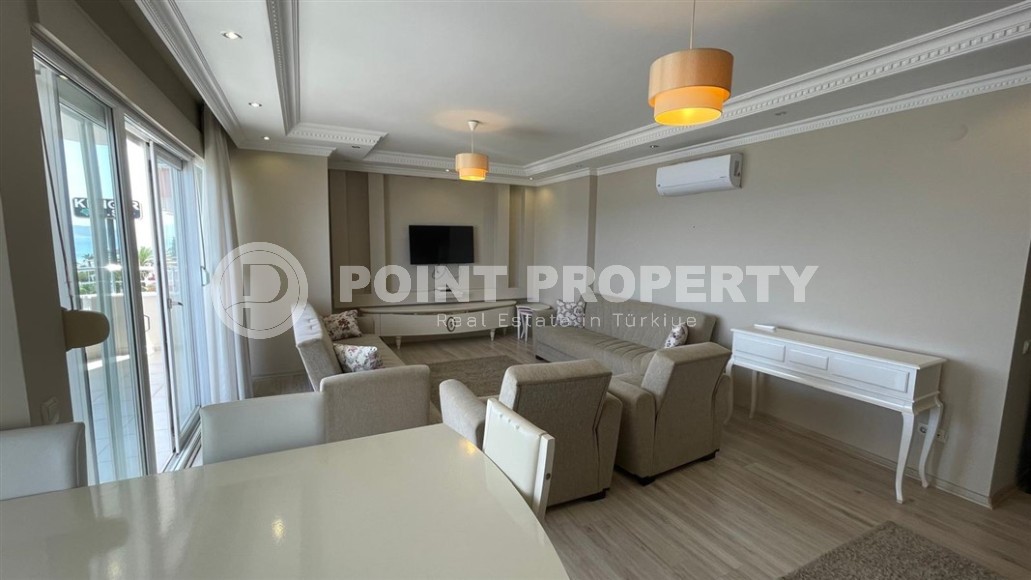 Благоустроенная квартира с роскошной локацией на первой линии от моря, в центре района Махмутлар-id-7989-фото-2