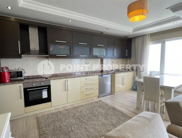 Благоустроенная квартира с роскошной локацией на первой линии от моря, в центре района Махмутлар-id-7989-фото-5