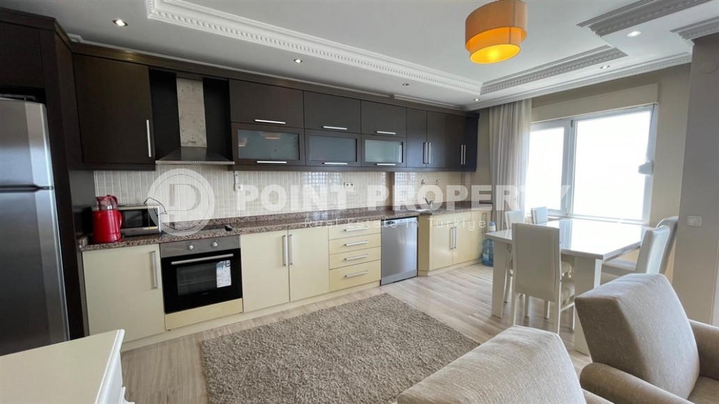 Благоустроенная квартира с роскошной локацией на первой линии от моря, в центре района Махмутлар-id-7989-фото-5