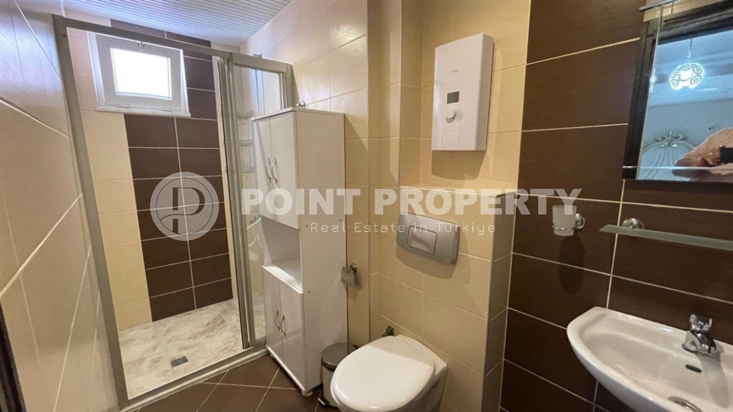 Благоустроенная квартира с роскошной локацией на первой линии от моря, в центре района Махмутлар-id-7989-фото-11