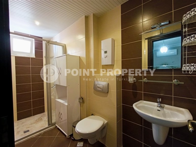 Благоустроенная квартира с роскошной локацией на первой линии от моря, в центре района Махмутлар-id-7989-фото-12