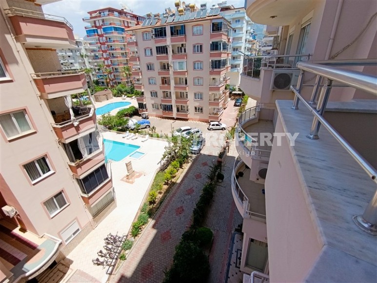 Благоустроенная квартира с роскошной локацией на первой линии от моря, в центре района Махмутлар-id-7989-фото-15