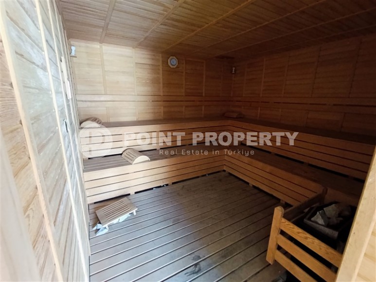 Благоустроенная квартира с роскошной локацией на первой линии от моря, в центре района Махмутлар-id-7989-фото-22