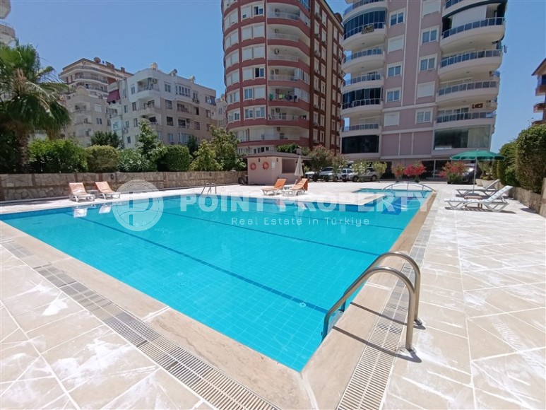 Благоустроенная квартира с роскошной локацией на первой линии от моря, в центре района Махмутлар-id-7989-фото-23