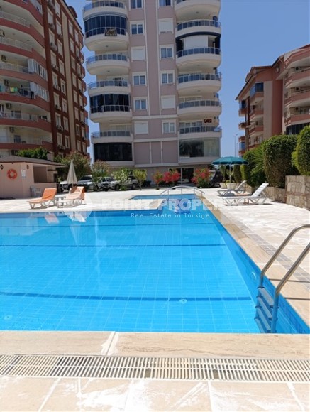 Благоустроенная квартира с роскошной локацией на первой линии от моря, в центре района Махмутлар-id-7989-фото-24