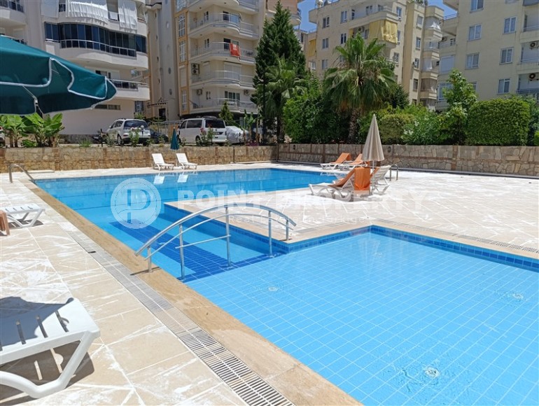 Благоустроенная квартира с роскошной локацией на первой линии от моря, в центре района Махмутлар-id-7989-фото-25