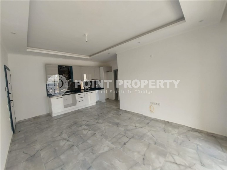 Уютные апартаменты 1+1 на этапе строительства, Махмутлар, 400 метров от моря.-id-1498-фото-2