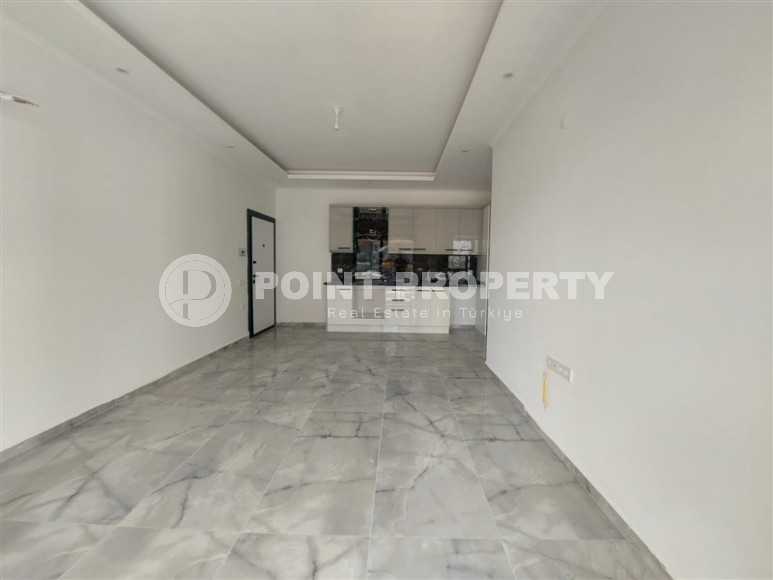 Уютные апартаменты 1+1 на этапе строительства, Махмутлар, 400 метров от моря.-id-1498-фото-3