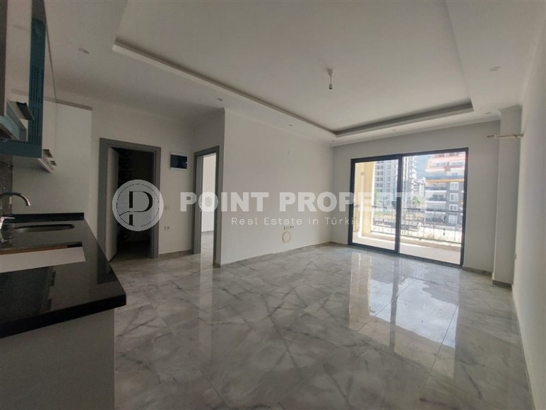 Уютные апартаменты 1+1 на этапе строительства, Махмутлар, 400 метров от моря.-id-1498-фото-4