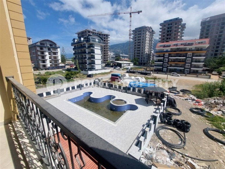 Уютные апартаменты 1+1 на этапе строительства, Махмутлар, 400 метров от моря.-id-1498-фото-8