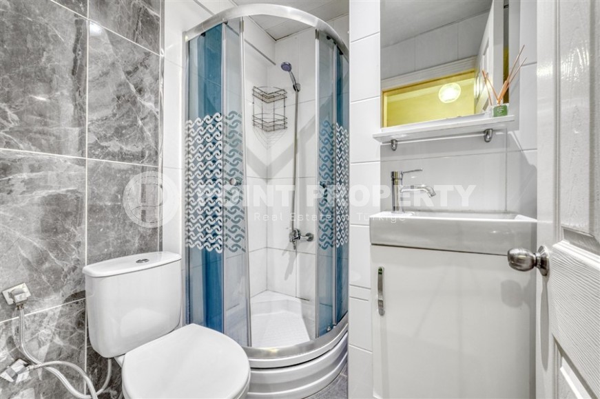 Modern 1+1 apartment 450 meters from the famous Cleopatra Beach, in the center of Alanya-id-8000-photo-11