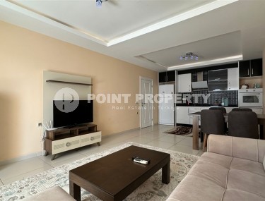 Spacious 1+1 apartment, with a total area of 70 m2, on the 3rd floor in a residential complex with hotel infrastructure in the center of Mahmutlar district-id-8002-photo-3