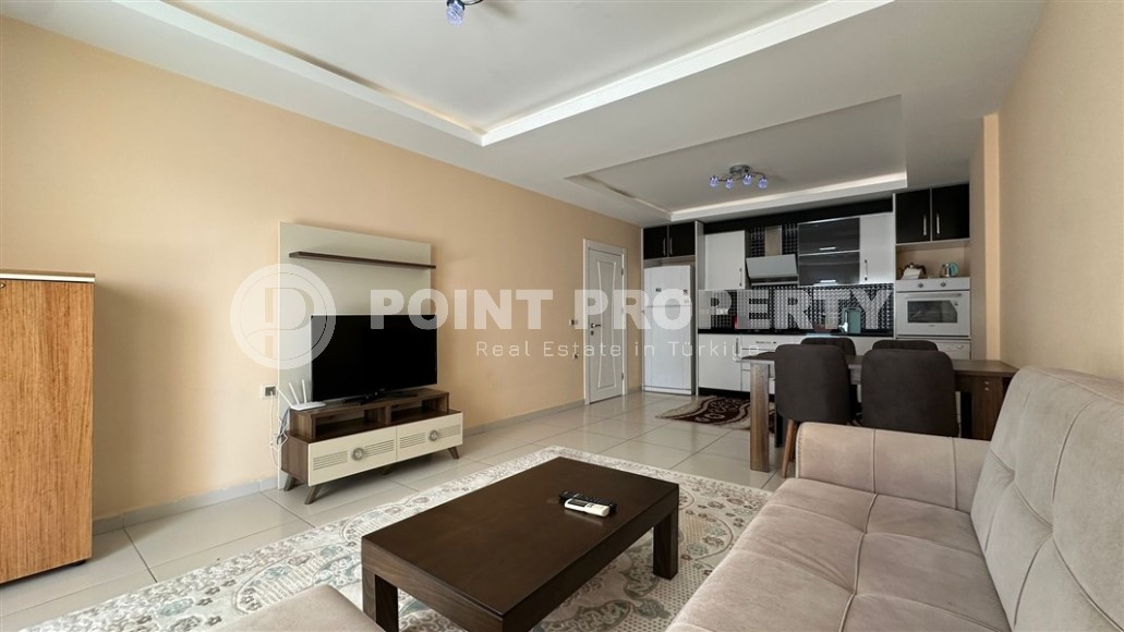 Spacious 1+1 apartment, with a total area of 70 m2, on the 3rd floor in a residential complex with hotel infrastructure in the center of Mahmutlar district-id-8002-photo-3