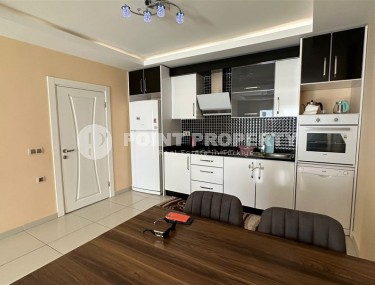 Spacious 1+1 apartment, with a total area of 70 m2, on the 3rd floor in a residential complex with hotel infrastructure in the center of Mahmutlar district-id-8002-photo-4